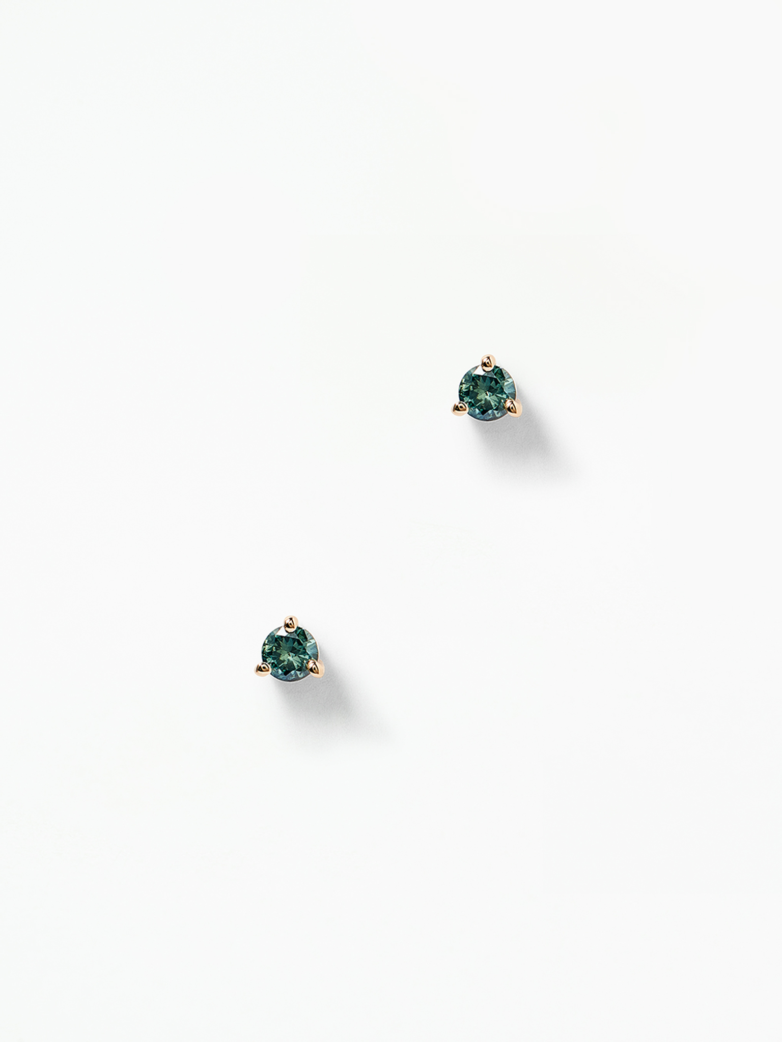 Medium round teal sapphire stud